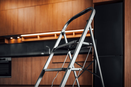 Metallic ladders in modern kitchen interior, selective focusの写真素材