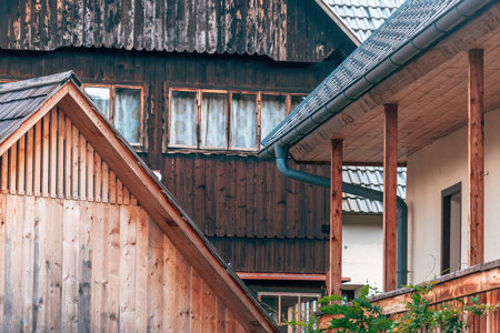 Traditional wooden alpine houses in Slovenian village, rustic architecture with natural charm. Selective focus.の写真素材