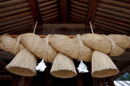 Rice straw rope used for purification in the Shinto japanese religion の写真素材