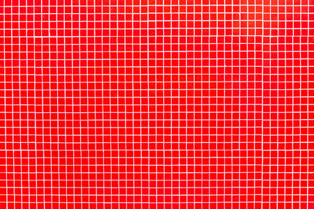 Real red mosaic background  Red glass tiles on white mortar with scratches and imperfections  No light reflections の写真素材
