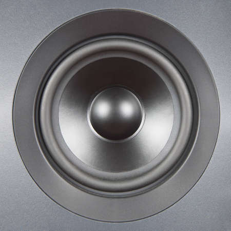 A silver speaker close up with symmetric light  Audio system equipment の写真素材