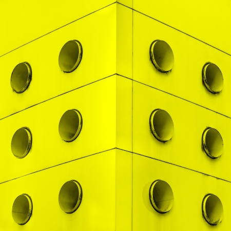 Yellow  architecture symmetrical abstract circular dirt vents の写真素材