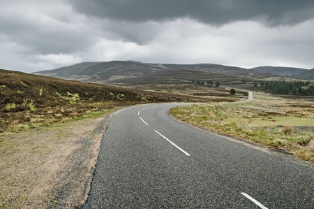 Highlands of Scotland road mountain landscape in cloud and rain weather  Uk, Europe の写真素材
