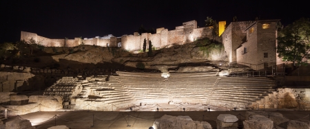 Malaga landmarks on night  Roman theater ruins and alcazaba  Andalusia, Spain, Europe 