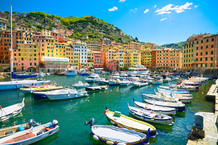 Camogli marina harbor, boats and typical colorful houses. Travel destination Ligury, Italy, Europe.の写真素材