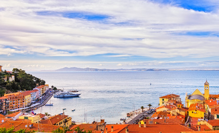 Porto Santo Stefano village, church and seafront panorama, italian travel destination. Monte Argentario, Tuscany, Italy.の写真素材