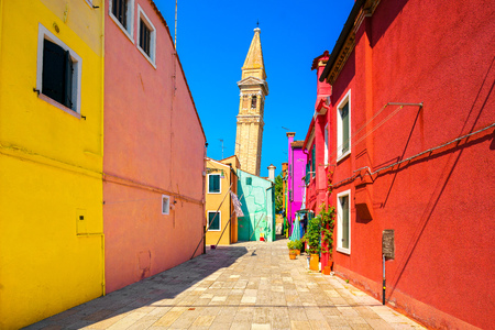 Venice landmark, Burano island colorful houses, church and campanile tower, Italy, Europe.のeditorial素材