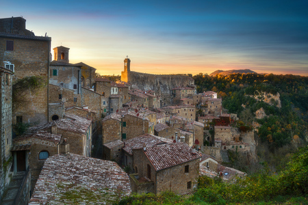 Tuscany, Sorano medieval village on tuff rocky hill. Panorama sunset. Italy, Europe.の写真素材