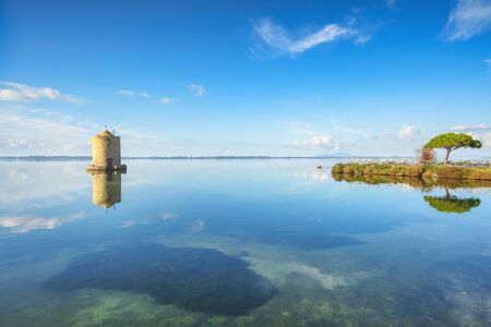 Old spanish windmill in Orbetello lagoon, medieval landmark in Monte Argentario, Tuscany, Italy.の写真素材