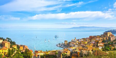 Porto Santo Stefano panoramic view and sailing regatta. Monte Argentario, Maremma Tuscany, Italy.の写真素材