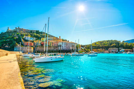 Porto Ercole village and boats in the harbor. Monte Argentario, Maremma Grosseto Tuscany, Italyの写真素材