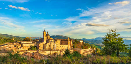 Urbino city skyline and Ducal Palace at sunset. Unesco world heritage site. Marche region, Italy, Europe.のeditorial素材