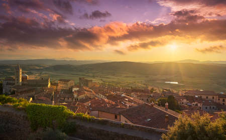 Massa Marittima old town and San Cerbone Duomo cathedral at sunset. Tuscany, Italy.の写真素材