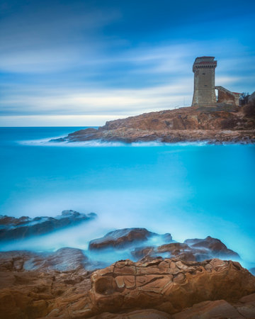 Calafuria tower and the sandstone rocks of Romito. Long exposure photography. Livorno, Tuscany region, Italy, Europeの写真素材