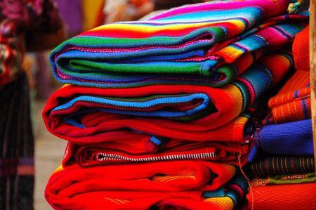 Brightly colored Mayan textiles in the marketの写真素材