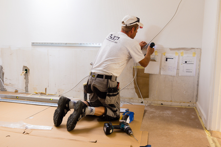 carpenter mounting IKEA kitchenのeditorial素材