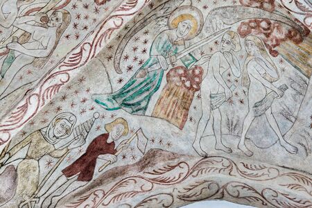 Gothic fresco in a danish church. the expulsion from paradise, Over Draby church, Denmark, Nov 14, 2016のeditorial素材
