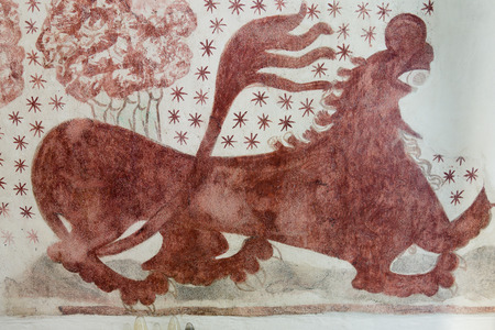Lion with a long tail, painted on the wall in a Danish church, Over dragon, Nov 14, 2016,のeditorial素材