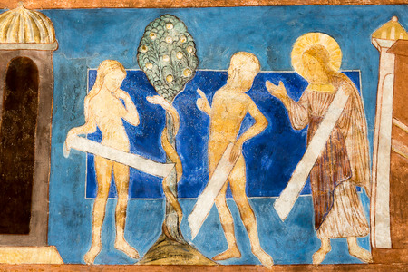 The Fall of Adam and Eve at the Tree of Knowledge. Romanesque wall painting in Bjaresjo churh, Sweden, Sept 04, 2014,のeditorial素材