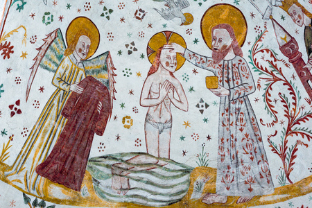 Baptism of Jesus In The Jordan River, a Gothic fresco in Tingsted churc, Denmark - April 11, 2017のeditorial素材
