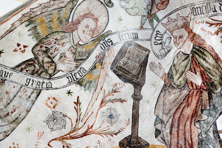 Fresco of the Annunciation. Archangel Gabriel greets Mary: Ave gratia plena dominus tecum, Tingsted church, Denmark - April 11, 2017のeditorial素材
