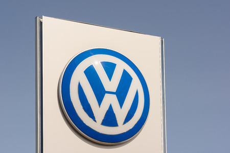 Volkswagen sign on a pole against blue sky, Fredericia, Denmark, August 23, 2017