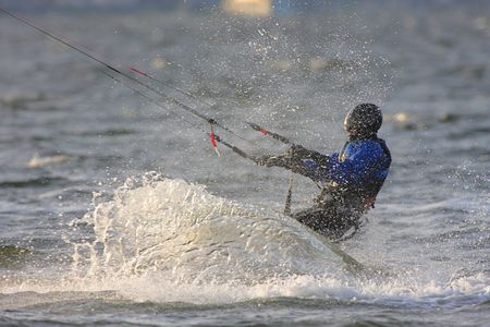 Man Kite Boarding in the ocean