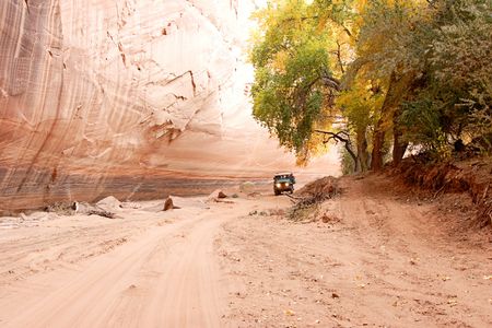 Tour truck in Canyon de Celly National Park on the Navajo Reservation in Arizonaの写真素材