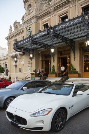 Expensive cars outside the Monte Carlo Casino in the Principality of Monaco, a sovereign city state, located on the French Riviera.のeditorial素材