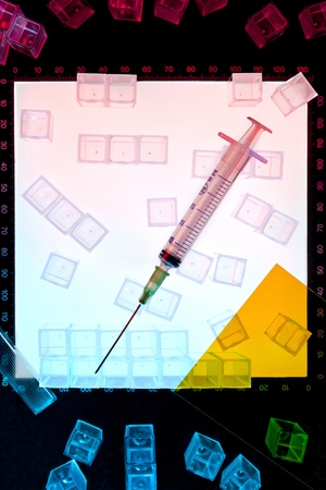 Syringe and test veils in a Biotechnology Laboratory の写真素材