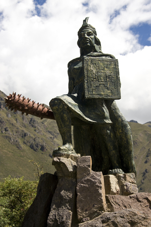 Statue of Inca king at Ollantaytambo in the Sacred Valley of the Incas - Peru in South Americaの写真素材
