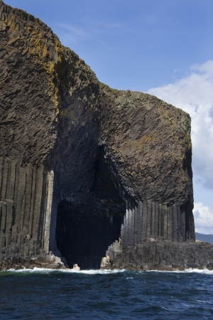 Basalt rock formation and Fingals Cave on the island of Staffa, Scotland の写真素材