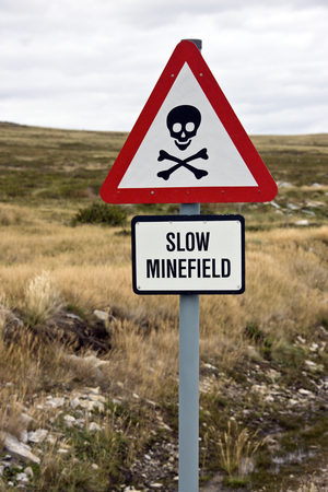 Danger Minefield sign near a road in the Falkland Islands  Islas Malvinas   の写真素材
