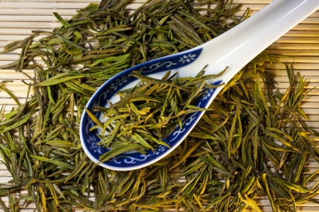 Chinese Green Tea is tea that is made from unfermented leaves and is pale in color and slightly bitter in flavor, produced mainly in China and Japan  Green tea is made solely with the leaves of Camellia sinensis that have undergone minimal oxidation durinの写真素材