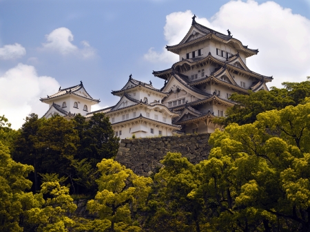 Himeji Castle is a hilltop Japanese castle complex located in Himeji, in Japan  The castle is regarded as the finest surviving example of prototypical Japanese castle architecture, comprising a network of 83 buildings with advanced defensive systems from のeditorial素材