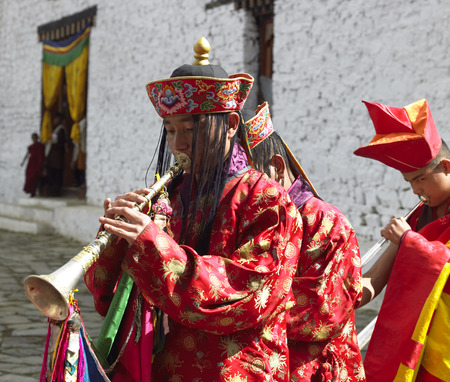 Musicians at the Paro Tsechu (Buddhist festival) in Paro Dzong in the Kingdom of Bhutan.のeditorial素材