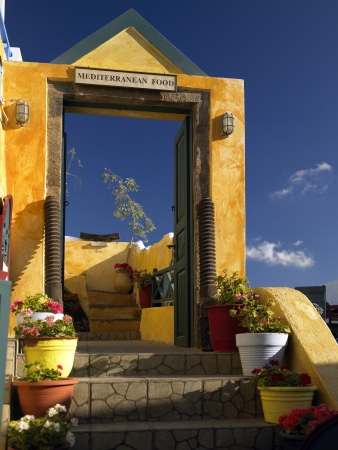 The doorway into a restaurant on the Greek island of Santorini in Greece.のeditorial素材