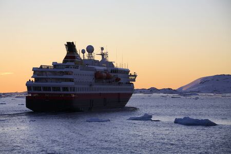 A large tourist ship in the Lamaire Channel in Antarctica.のeditorial素材
