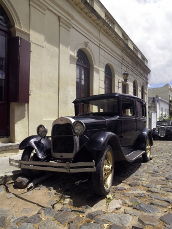 Old cars being used as a street ornament in the UNESCO World Heritage town of Colonia del Sacramento in Uruguay, South America.のeditorial素材