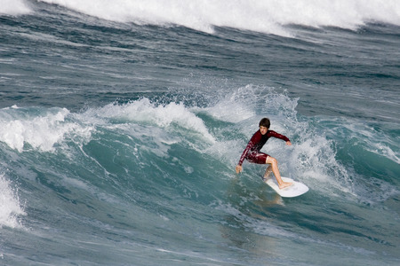 Surfing off Fistral Beach in Newquay in Cornwall, United Kingdom