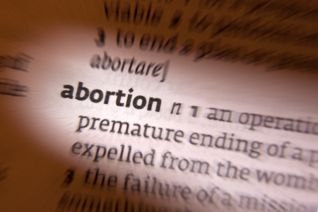 Abortion is the termination of pregnancy by the removal or expulsion from the uterus of a fetus or embryo prior to viability. An abortion can occur spontaneously, in which case it is usually called a miscarriageの写真素材
