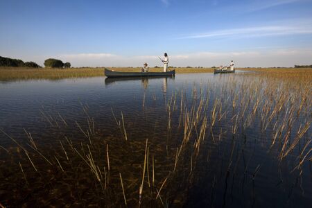 Tourists on the Okavango Delta in Botswanaのeditorial素材