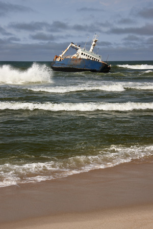 Wreck of a ship on the Skeleton Coast in Namibia  The coast is named after whale and seal bones which covered the shore when the whaling industry was still active, as well as the skeletal shipwrecks caused by rocks offshore in fog  More than a thousand veのeditorial素材