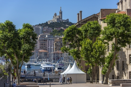 The city of Marseille in the South of France, with the Cathedral de Notre-Dame-de-la-Garde high on a hill overlooking the city  のeditorial素材