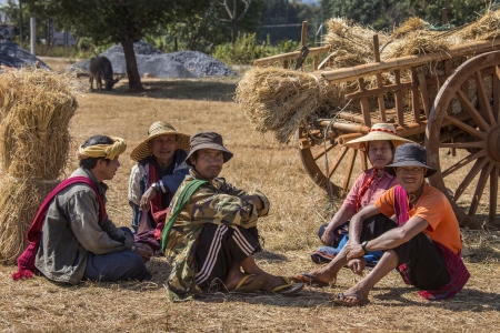 A group of farm hands taking a rest in the countryside near Taunggyi in Shan State in central Myanmar - Burma のeditorial素材