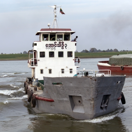 River traffic on the Irrawaddy River or Ayeyarwaddy River  in Myanmar - Burma  -  It is the countryのeditorial素材