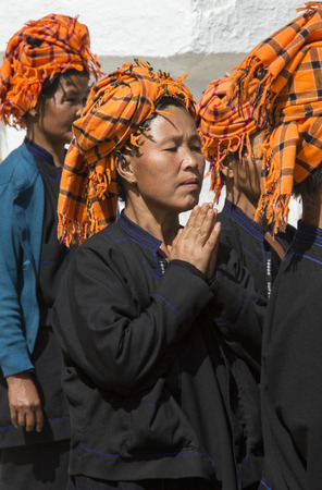 Group of PaO women at prayer at a temple near Inle Lake in Shan State in central Myanmar - Burma  のeditorial素材
