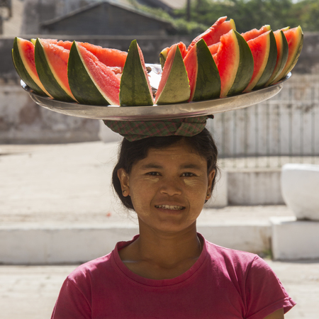 A Burmese woman selling watermelon at a temple in Bagan in Myanmar - Burma  のeditorial素材