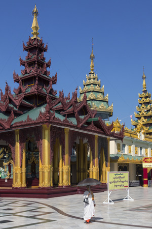 Temples in the Shwedagon Pagoda complex, officially titled Shwedagon Zedi Daw, in the city of Yangon in Myanmar - Burma  のeditorial素材