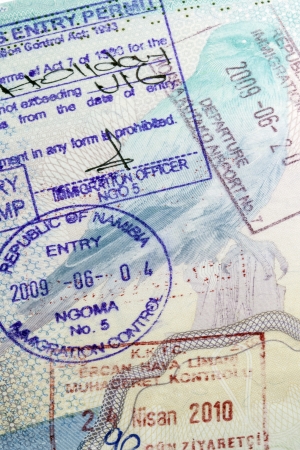 Visa Stamps in a European Passport - This is an official document issued by a government, certifying the holderのeditorial素材